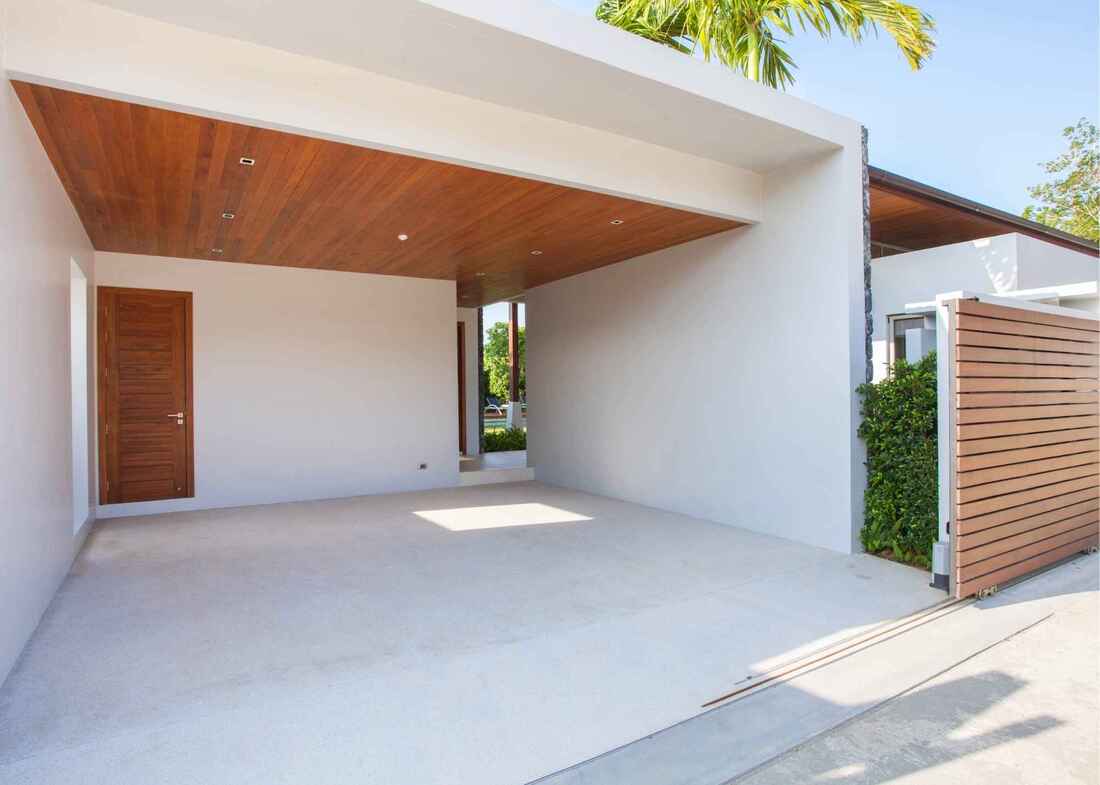 Contemporary Carport with timber ceiling and white walls and floor